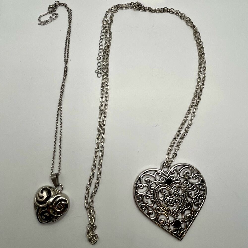 2 silver tone heart necklaces